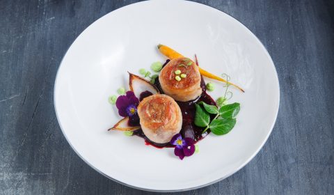 Cooked Pork Loin Roast with Vegetables, restaurant dish