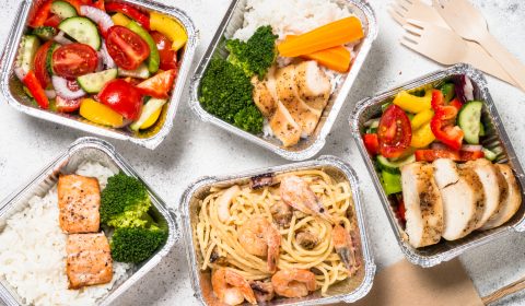 Food delivery concept – healthy lunch in boxes.